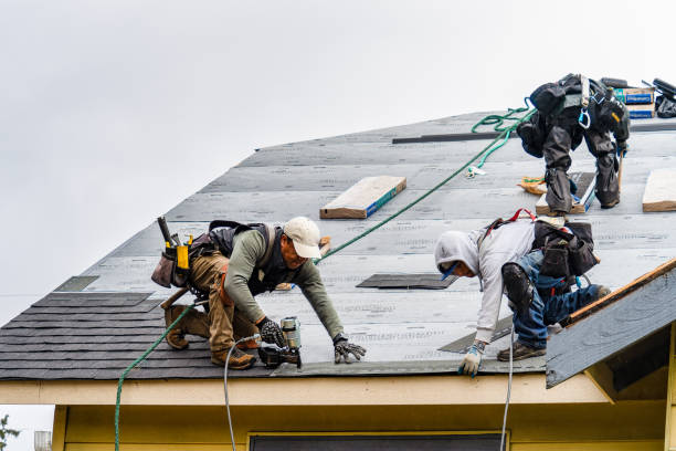Professional Gutter Installation technician working in Roslyn, PA
